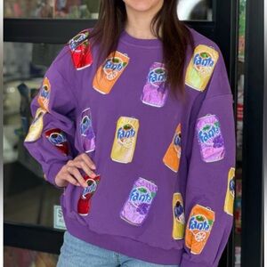 Coca Cola Women's Purple Sweater with Fanta‎ Can Patterns